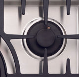 Close-up of a Capital gas stove burner with black grate and silver base
