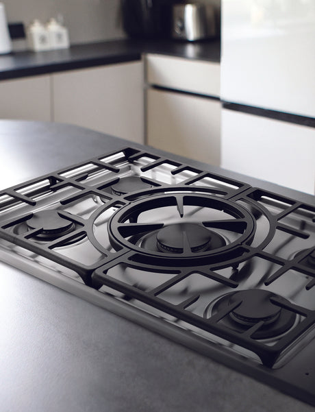Capital Stainless steel gas cook top in a kitchen setting